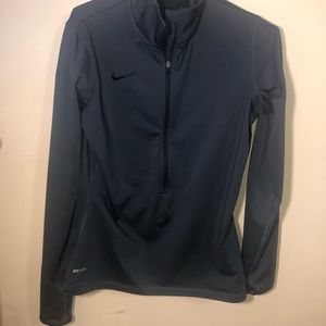 A grey dry fit half zip sweater